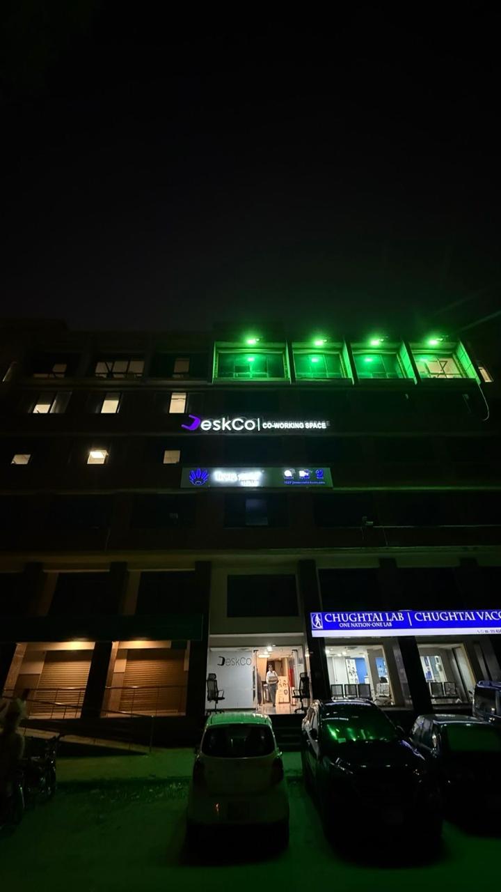 DeskCo coworking space exterior at night